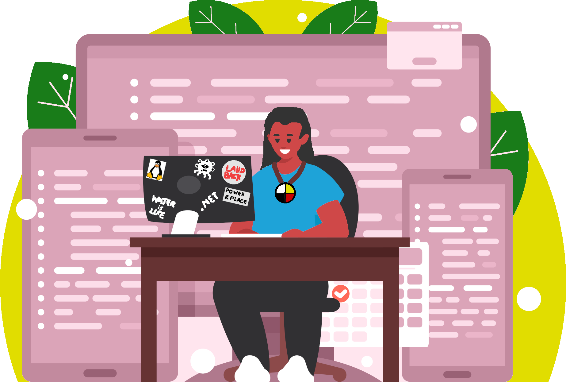 Indigenous programmer working at a desk